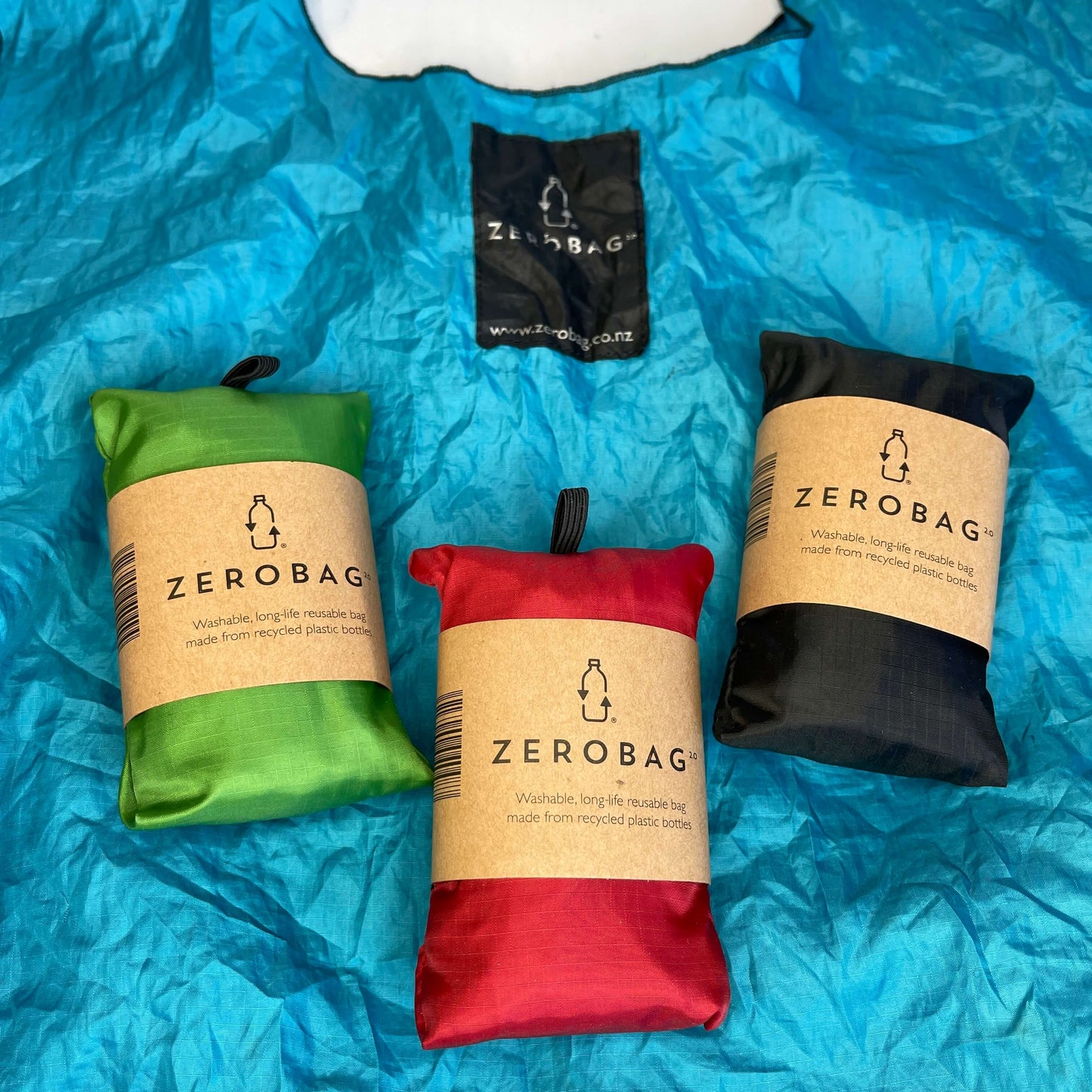 Collection of coloured tote bags.