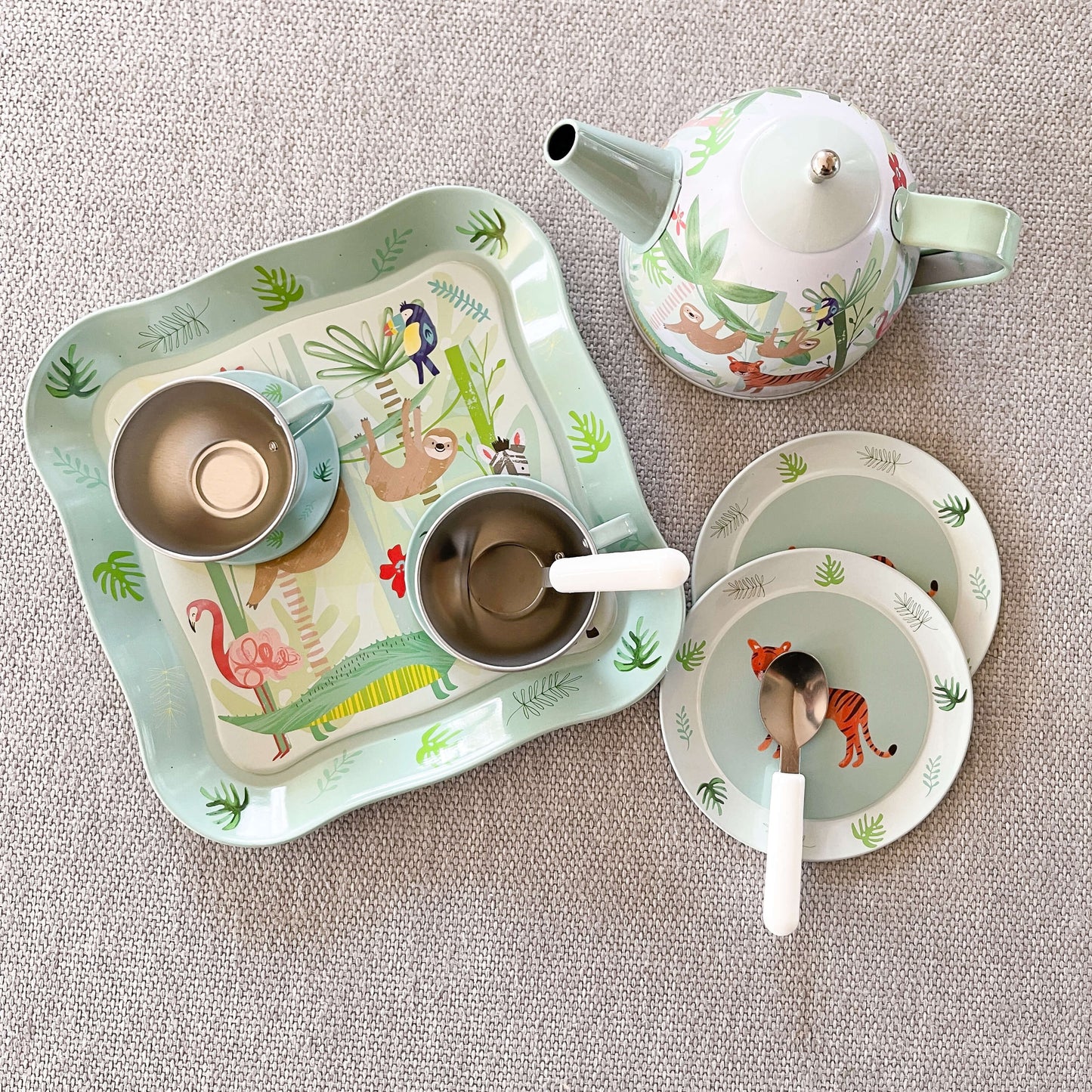 Childrens tin zoo themed tea set.