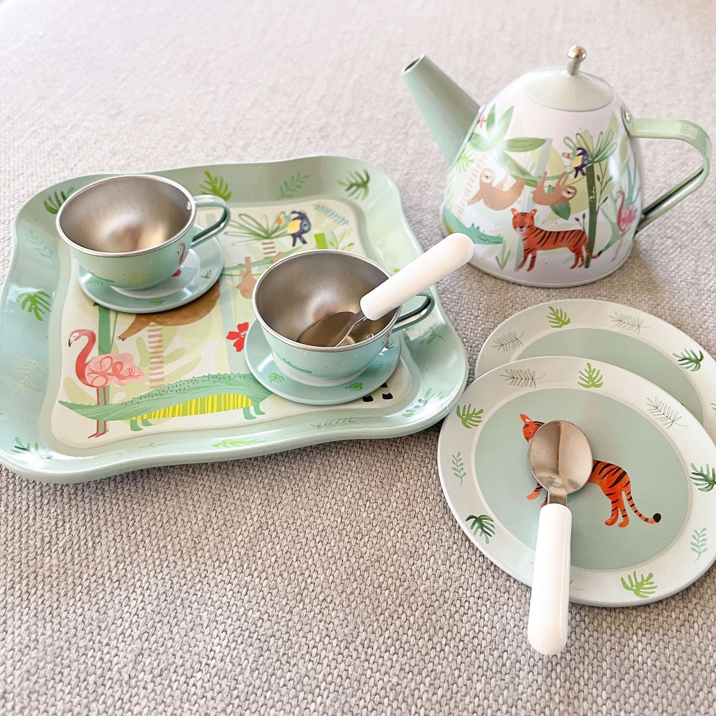 Childrens tin zoo themed tea set.