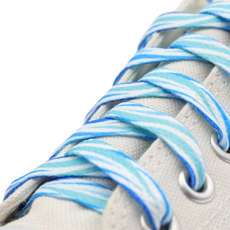 Blue and white shoelaces.