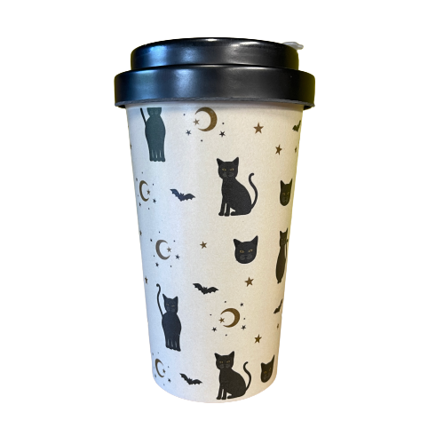 Travel coffee cup with black cats, bats and stars printed on it.