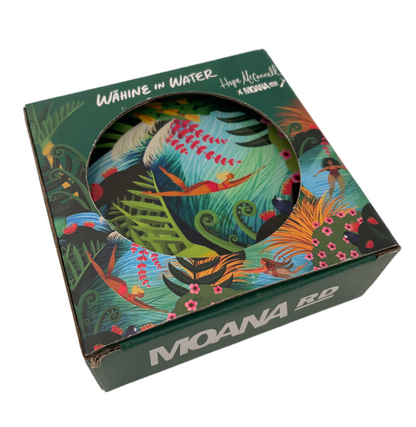 Dark green cardboard box containing 6 round glass coasters featuring bright colourful artwork of native New Zealand flora & fauna and women swimming in water.