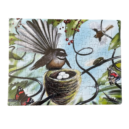 Treasures of Aotearoa tray puzzle featuring Fantail bird and its nest.