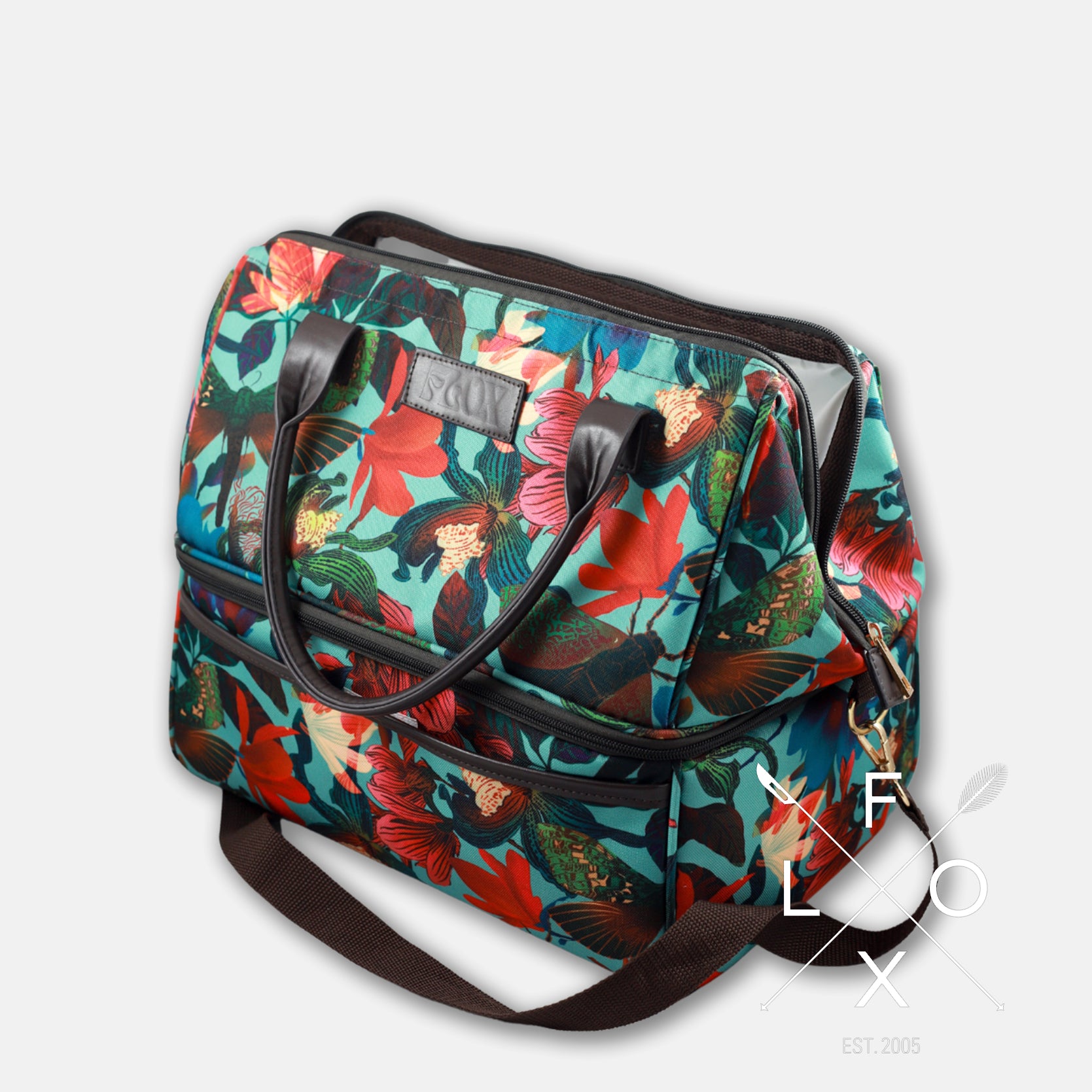 Colourful picnic cooler bag with teal blue background and magnolia flower print.