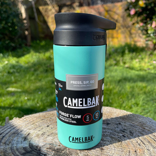 Stainless steel Camelbak insulated coffee cup with a press to sip function in Coastal green colour.