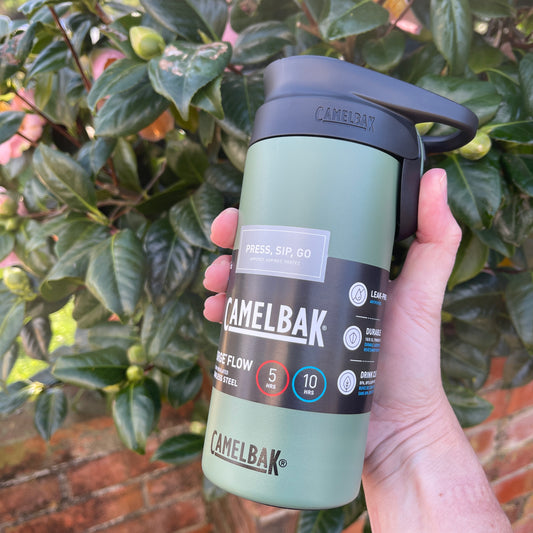 Stainless steel Camelbak insulated coffee cup with a press to sip function in moss green colour.
