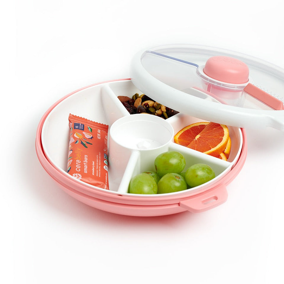 Gobe snack spinner lunch box in coral pink and white.