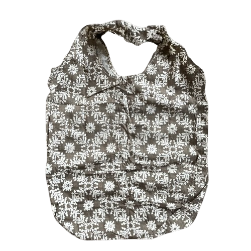 Taupe cotton tote bag with white floral decorative pattern.
