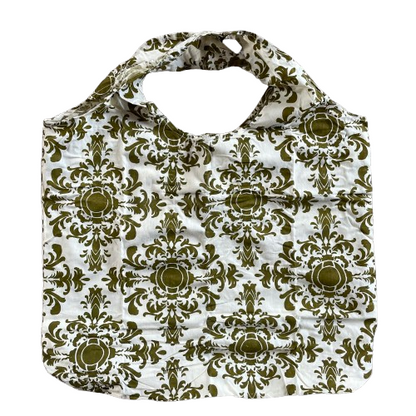 White cotton tote bag with olive green floral decorative pattern.