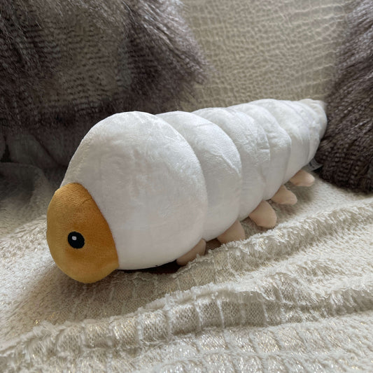 Plush soft toy in the form of a Huhu Grub.