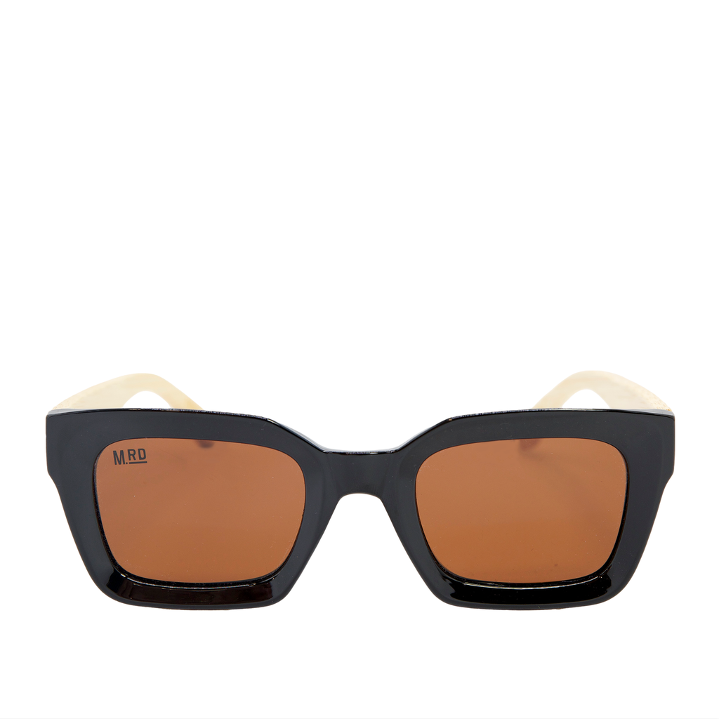 Sunglasses with black frame and brown lenses on a white background.
