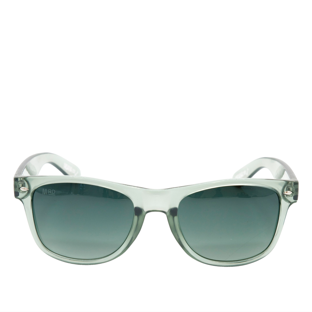 A pair of sunglasses with a translucent frame and dark gray gradient lenses, shown against a plain white background.