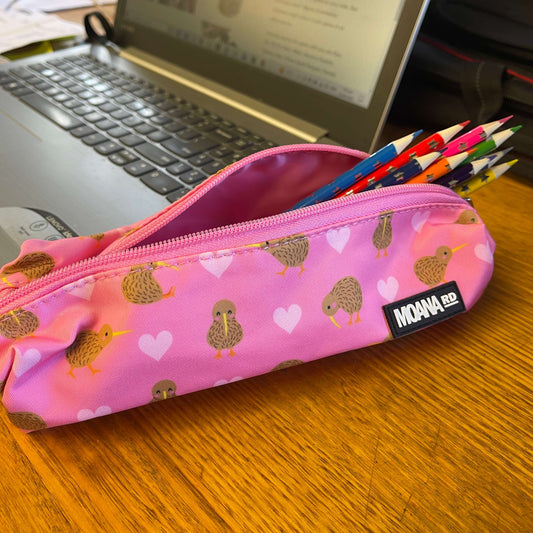Pink pencil case with hearts and kiwi birds.