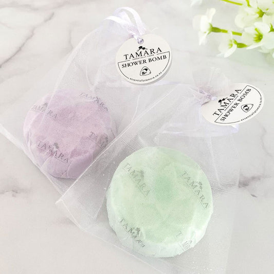 Individual shower bombs in organza bags.