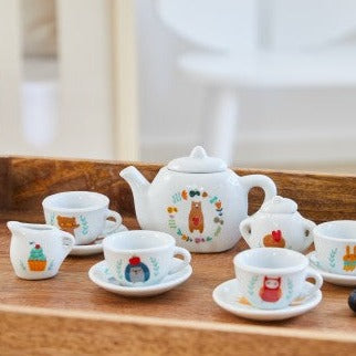Childrens porcelain tea set featuring woodland animals.