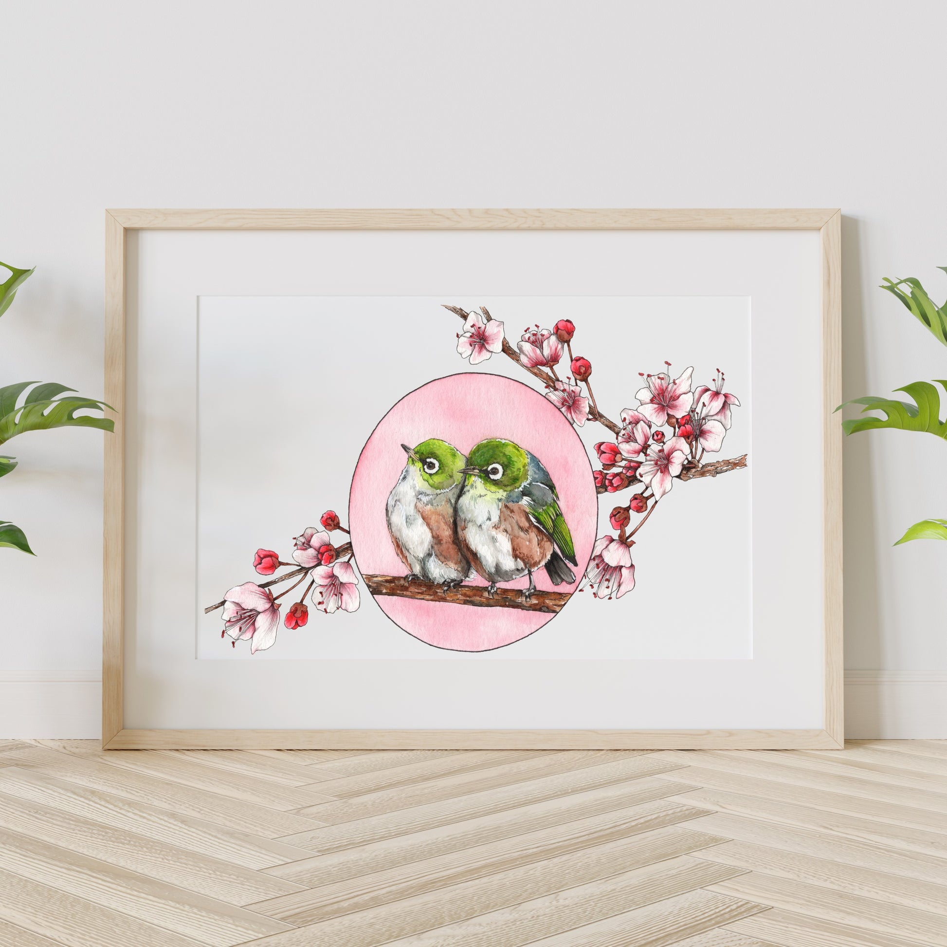 Artwork featuring 2 Waxeye birds on a branch with pink blossoms surrounding them.