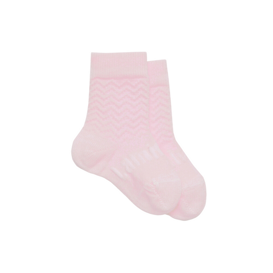 Pale pink baby merino crew socks with a raised zigzag pattern.