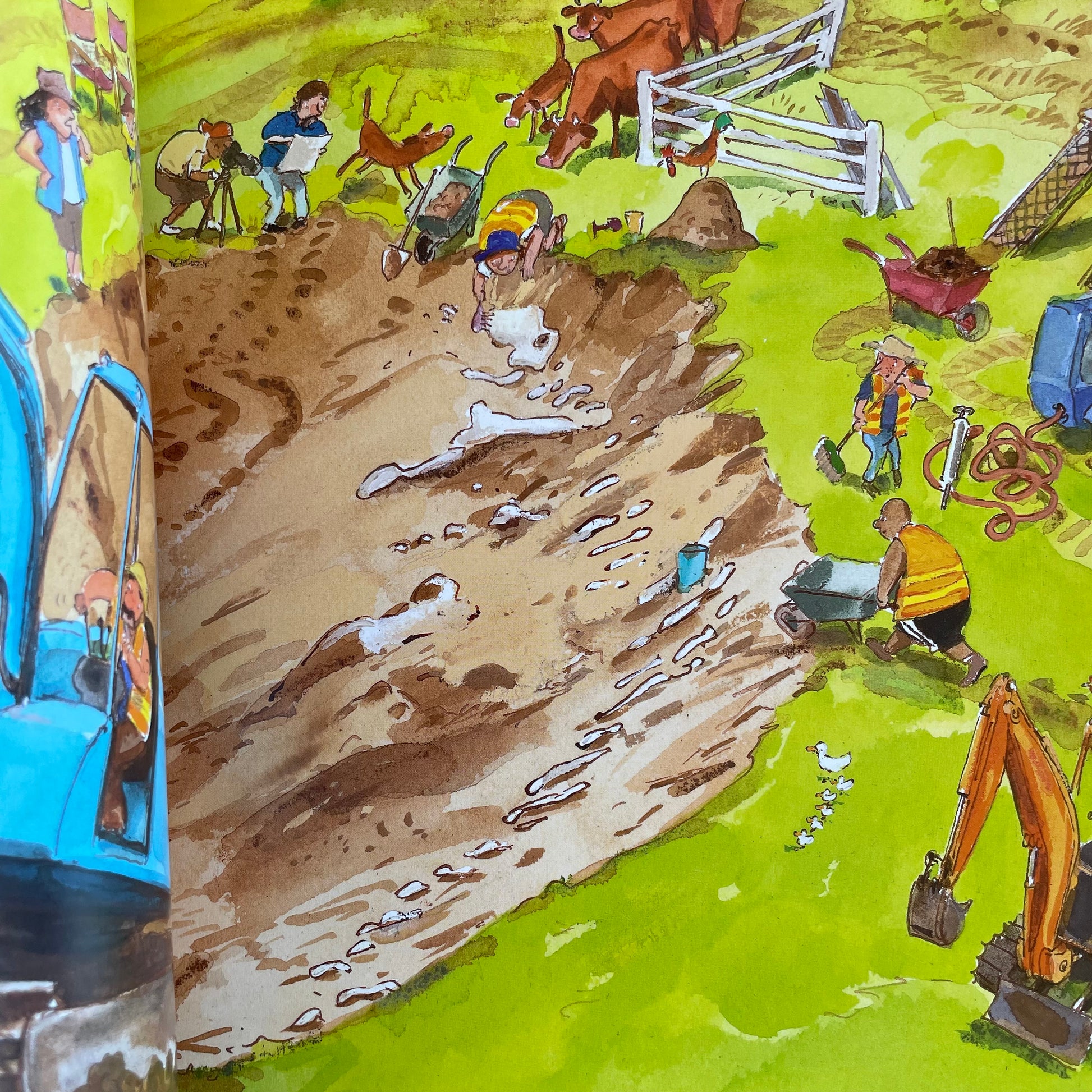 Inside page from the story showing an image of the whole community helping to dig a big hole.