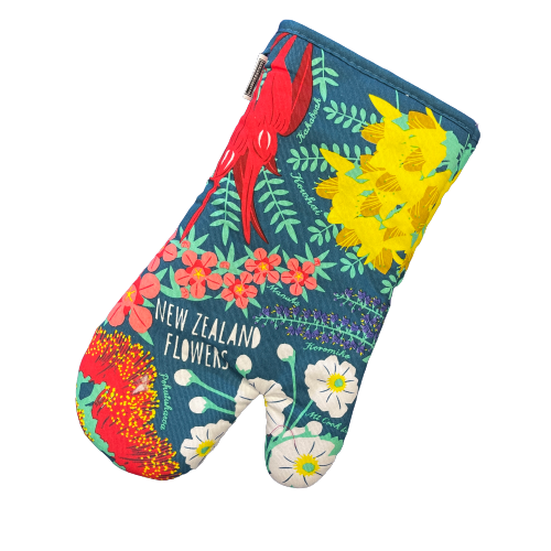 Dark teal blue oven mitt with bright NZ flowers printed on it.
