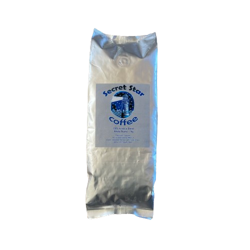 Silver bag of coffee beans with label Secret Star Coffee.