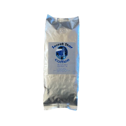 Silver bag of coffee beans with label Secret Star Coffee.