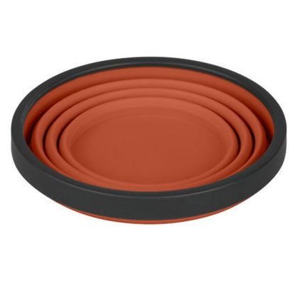 Rust orange silicone collapsible X cup by Sea to Summit.