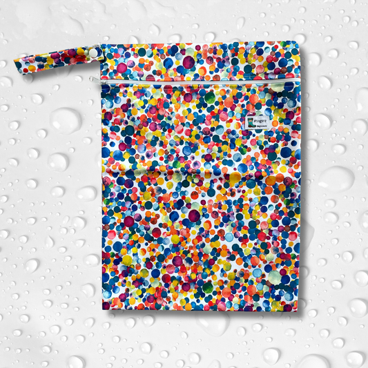 Wetbag in a multi coloured dot print.