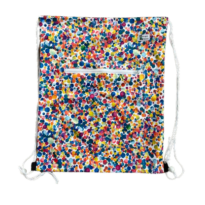 Drawstring backback style wetbag in mutlicoloured dot print and a zip pocket on the front.