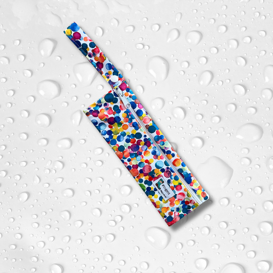 Small wetbag suitable for cutlery or toothbrushes in a multicoloured dotty print.