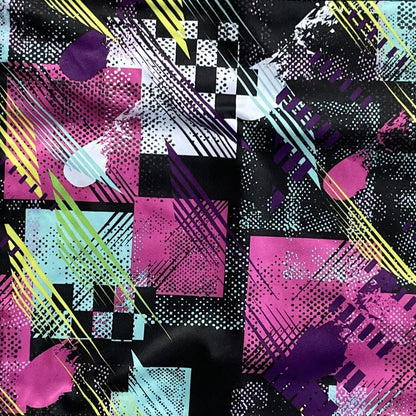 Close up of a pink and black abstract fabric.