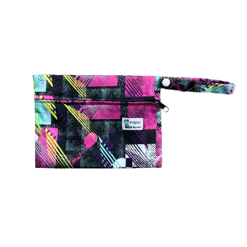 Small wet bag in a pink and black abstract print.