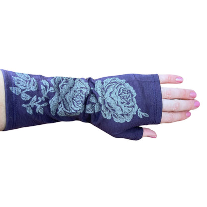 Fingerless merino gloves in purple with silver rose print.