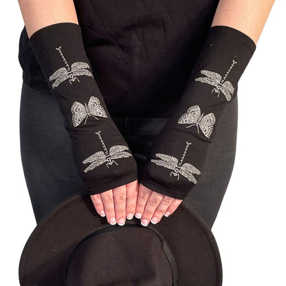 Fingerless merino gloves in black with dragonfly print.