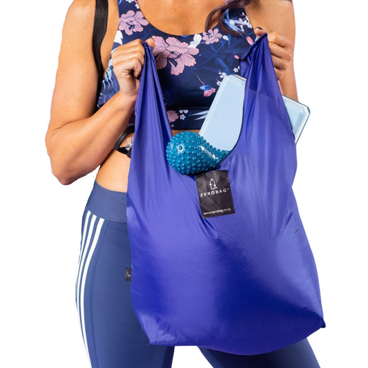 Blue Zero bag full of gym gear carried by women.