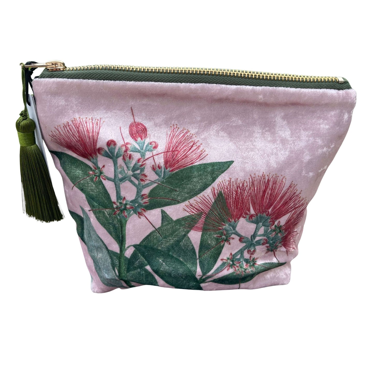Pale pink velvet cosmetic bag with green tassel and a Pohutukawa flower print.