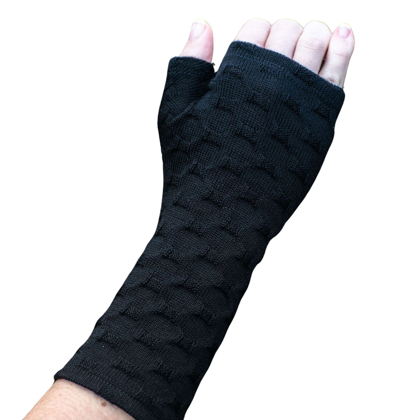 Fingerless merino gloves in textured black knit.