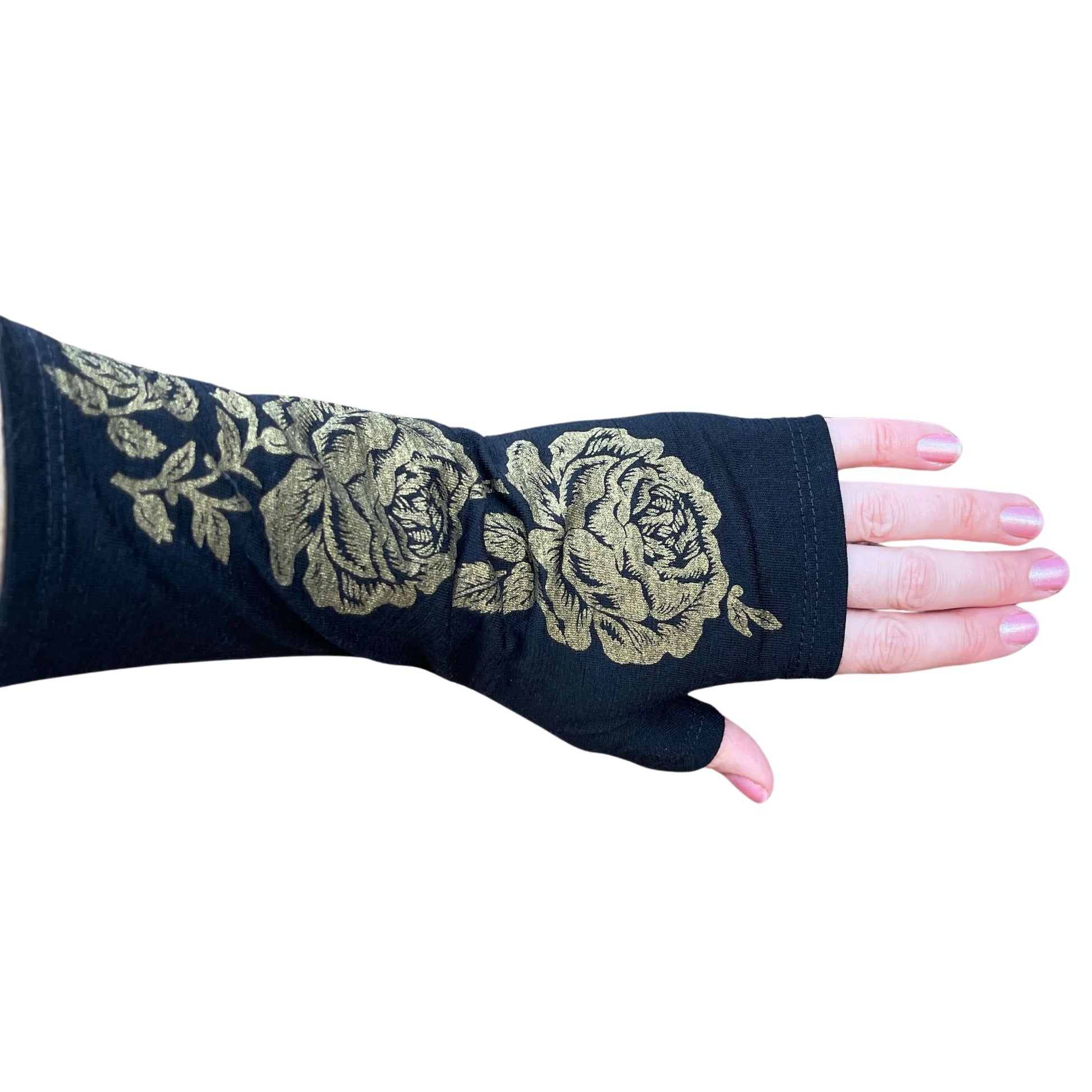 Fingerless merino gloves in textured black knit.
