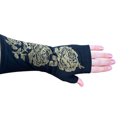 Fingerless merino gloves in textured black knit.
