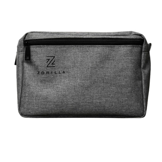 Grey water resistent toiletry bag with Zorilla logo printed on it.
