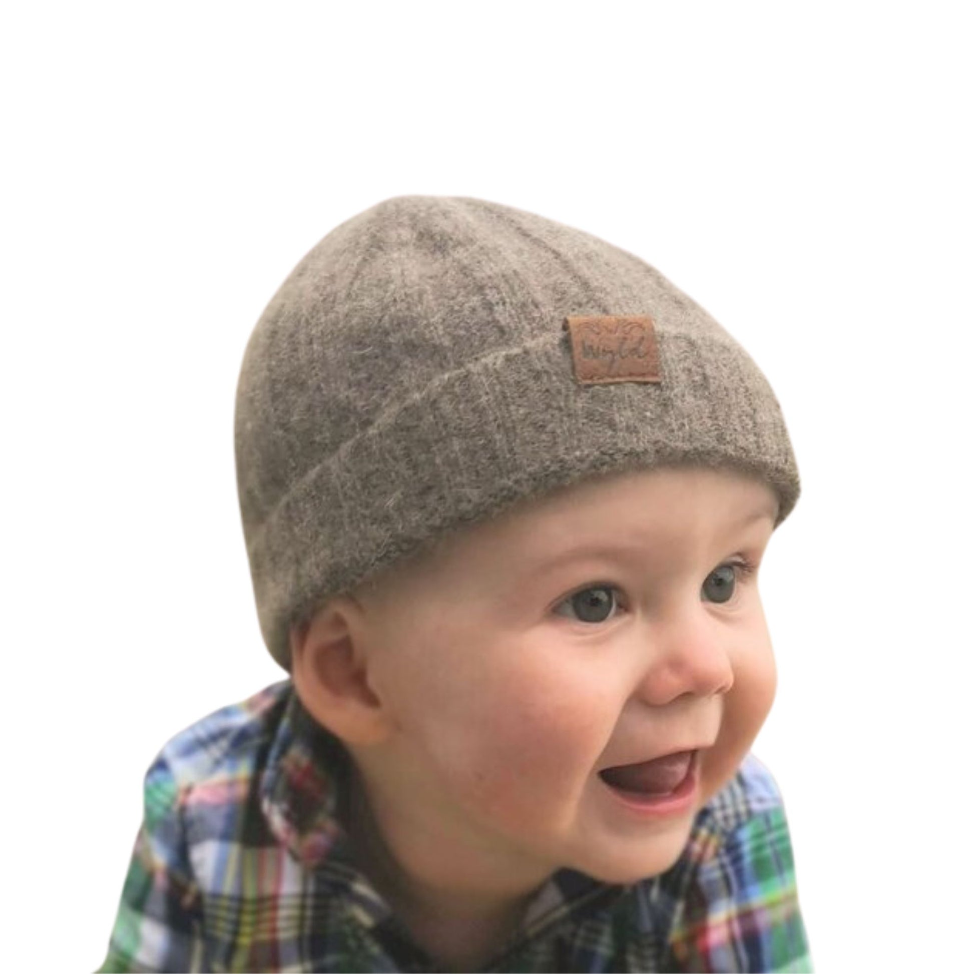 Baby wearing a brown knit beanie from Wyld.