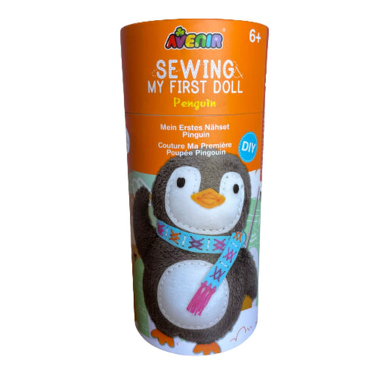 Childrens penguin sewing kit in a cardboard tube.