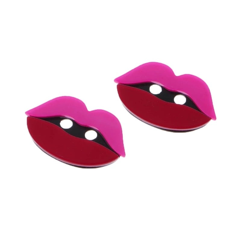 Super cute acrylic shoelace decorations from the school fundraising shop. These are lips