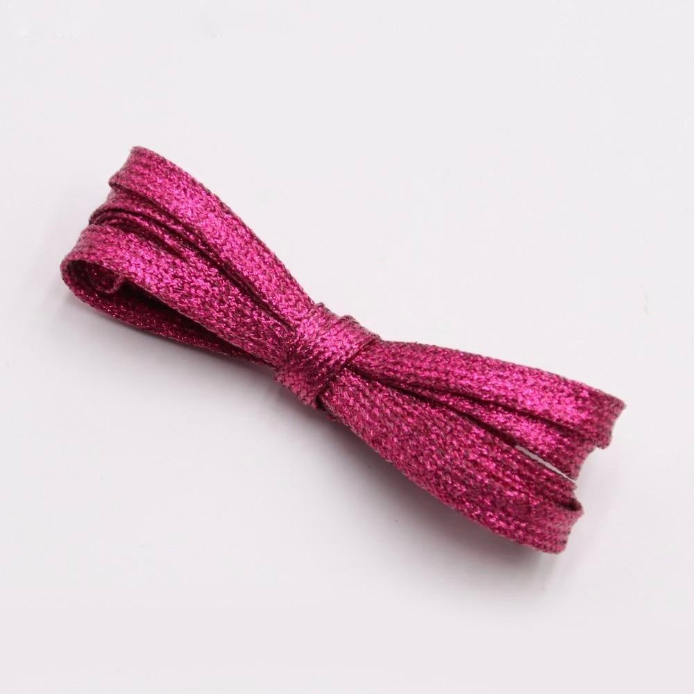 Pink metallic shoelaces.
