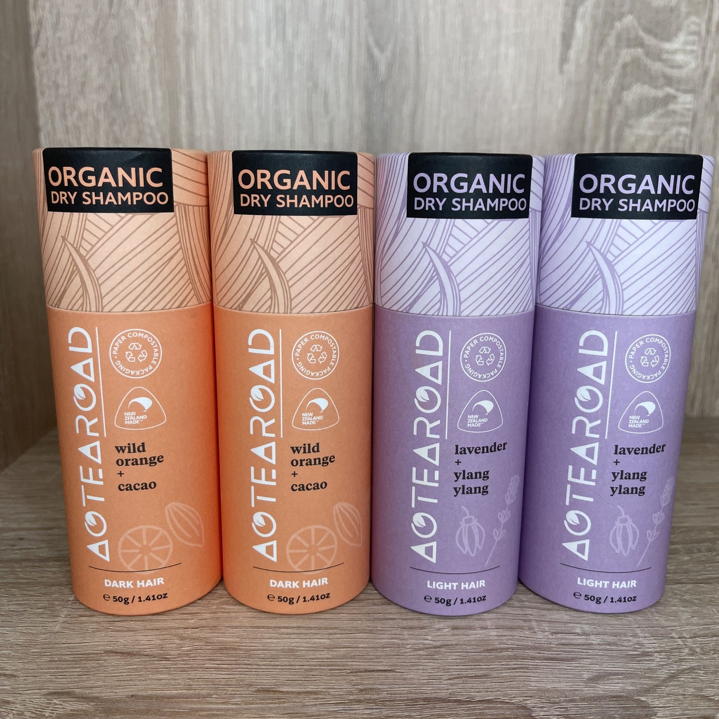 Organic dry shampoo for light and dark hair in a cardboard tube from Aotearoad.