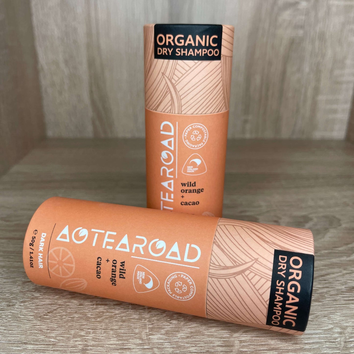 Organic dry shampoo for dark hair in a cardboard tube from Aotearoad.