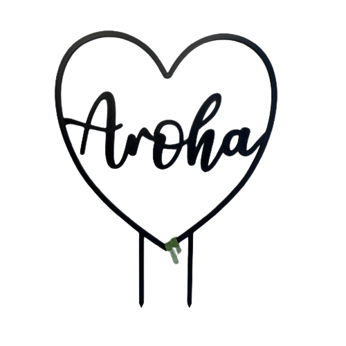 Heart shaped plant climbing frame with the word Aroha in  the middle.