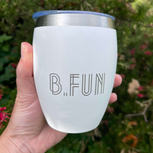 White stainless coffee mug with B.FUN engraved into it.