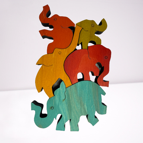 Wooden coloured balancing elephants.