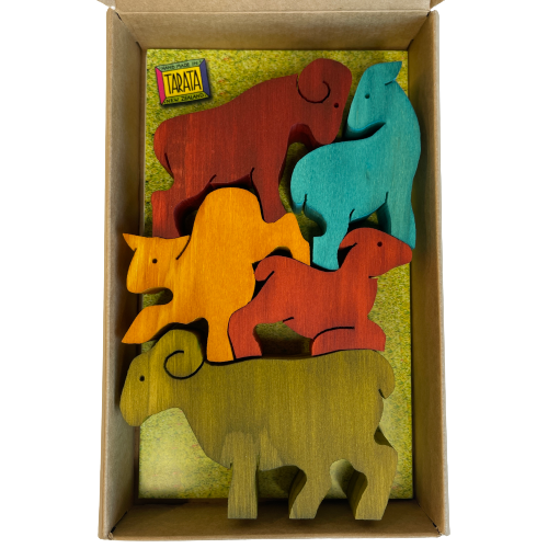 Box of wooden coloured balancing sheep.