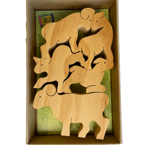 Box of natural wooden balancing sheep.